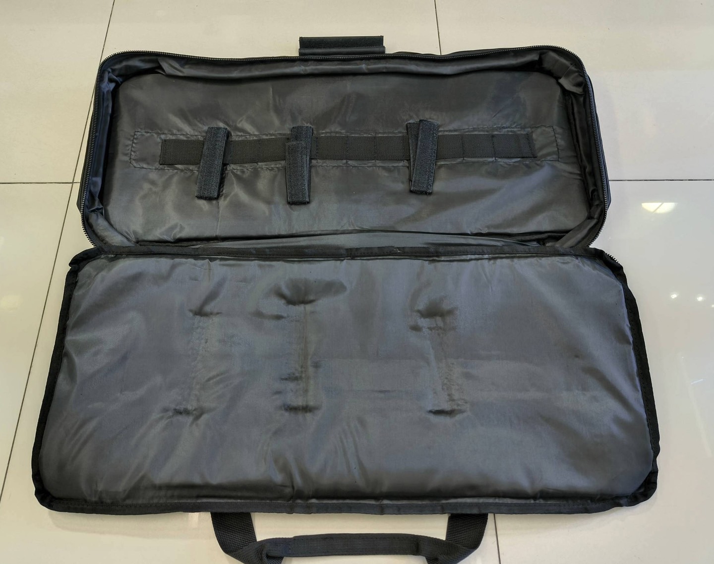 กระเป๋าผ้าสำหรับใส่ปืนยาว 60 CM (ป้ายตีนตุ๊กแกอาจจะไม่เหมือนกัน)