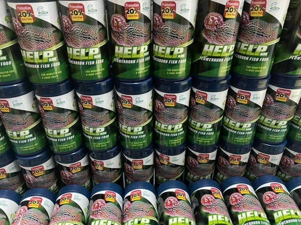 HELP KOK FLOWERHORN FISH FOOD 100 g.(อาหารปลาหมอสีสูตรเร่งโหนก และรูปทรง โปรตีนสูง เร่งโหนกไว)