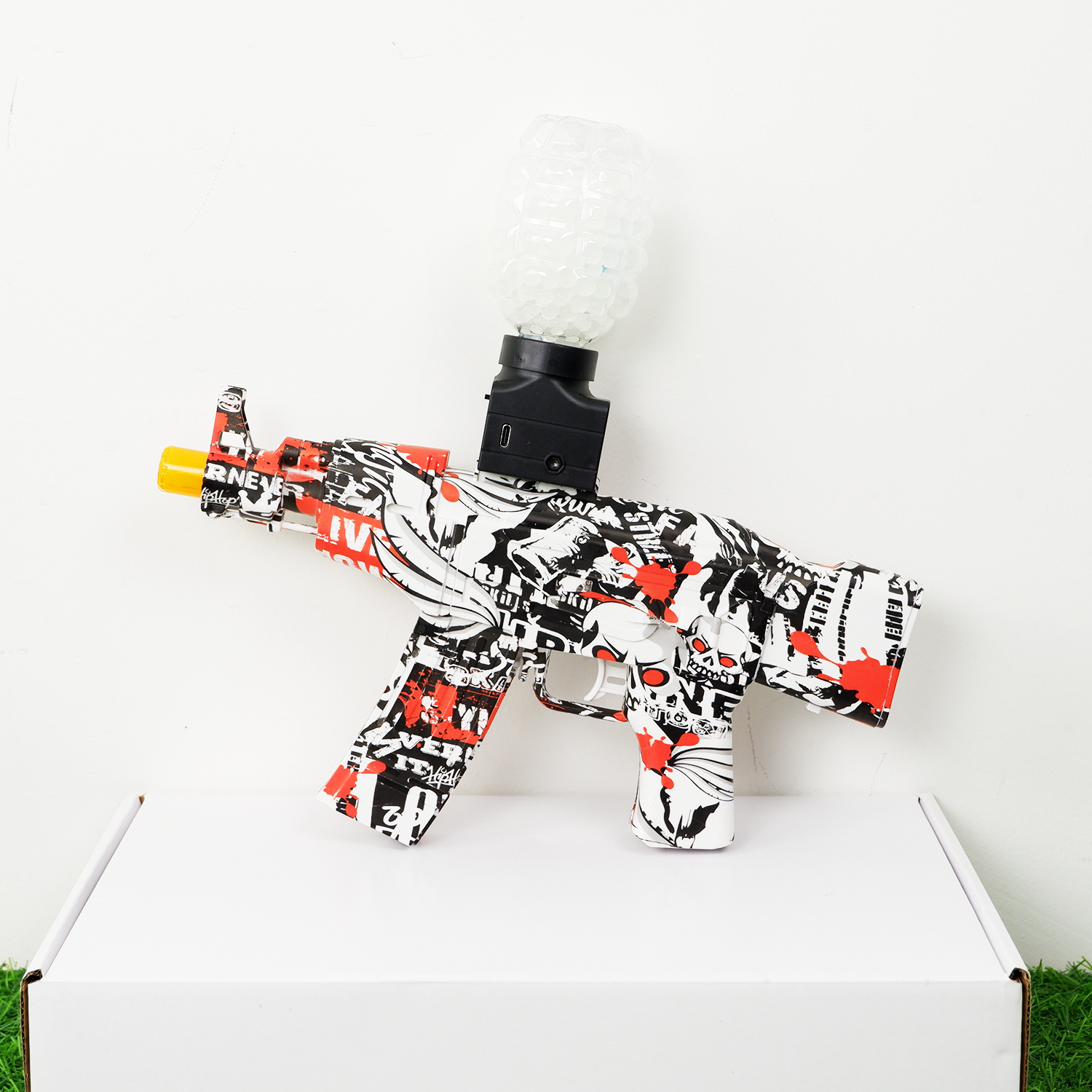 (03)AKM47 mini สีแดงลายกราฟิกตี้ ปืนเจลไฟฟ้า