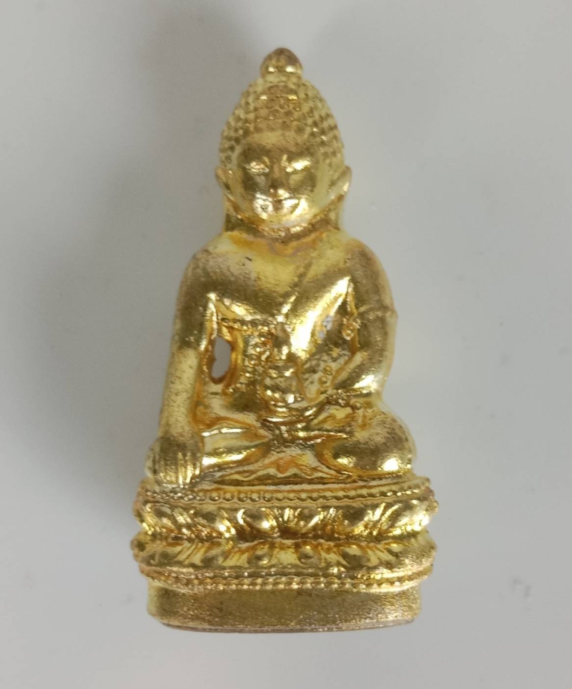 597.พระกริ่งจักรตรี เนื้อทองทิพย์