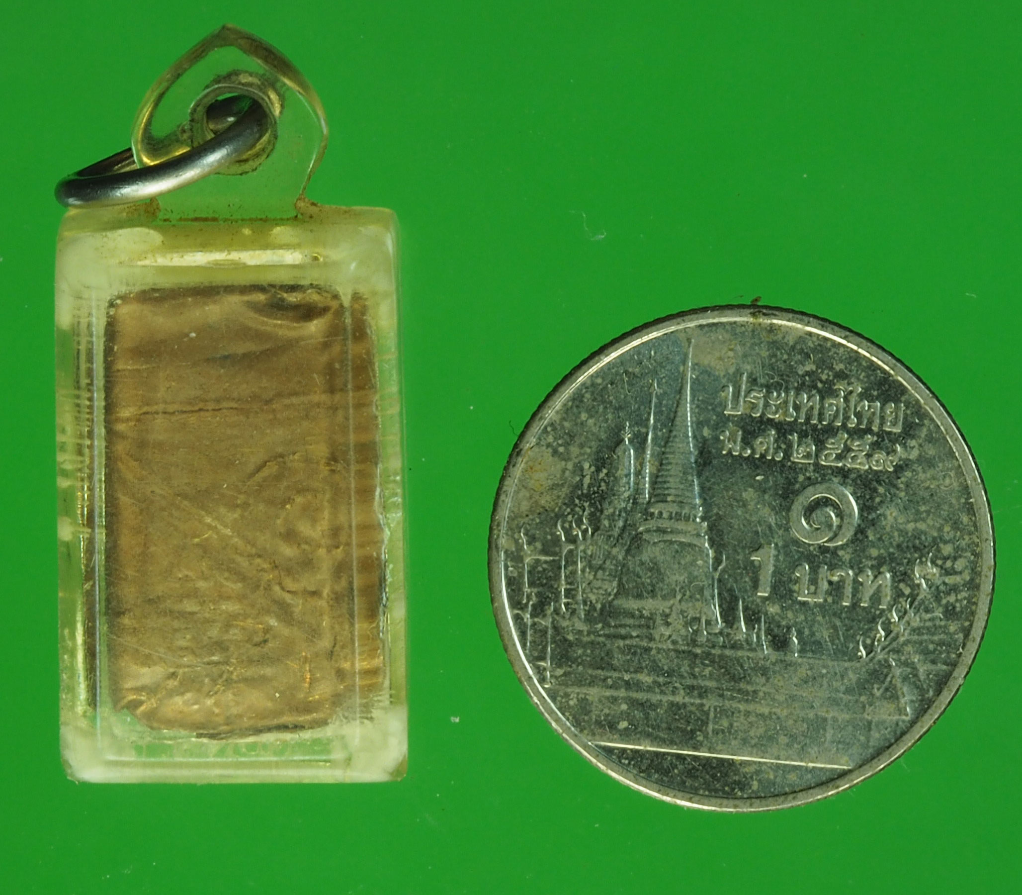 A66 แผ่นตะกรุด เลี่ยมพลาสติกเก่า ไม่ทราบที่และปีสร้าง 12