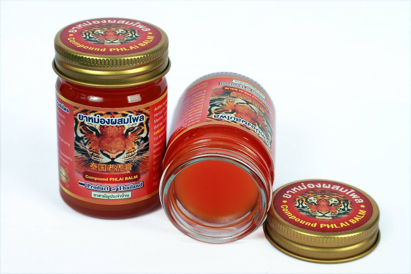 ยาหม่องหน้าเสือสีแดง สูตรร้อนไพลเข้มข้น ขนาด 50 กรัม ยาหม่องที่ขายดีมากในกลุ่มทัวร์จีน 泰国老虎膏 Thai Plai Balm 50 กรัม (Tiger Phlai Red Balm 50)