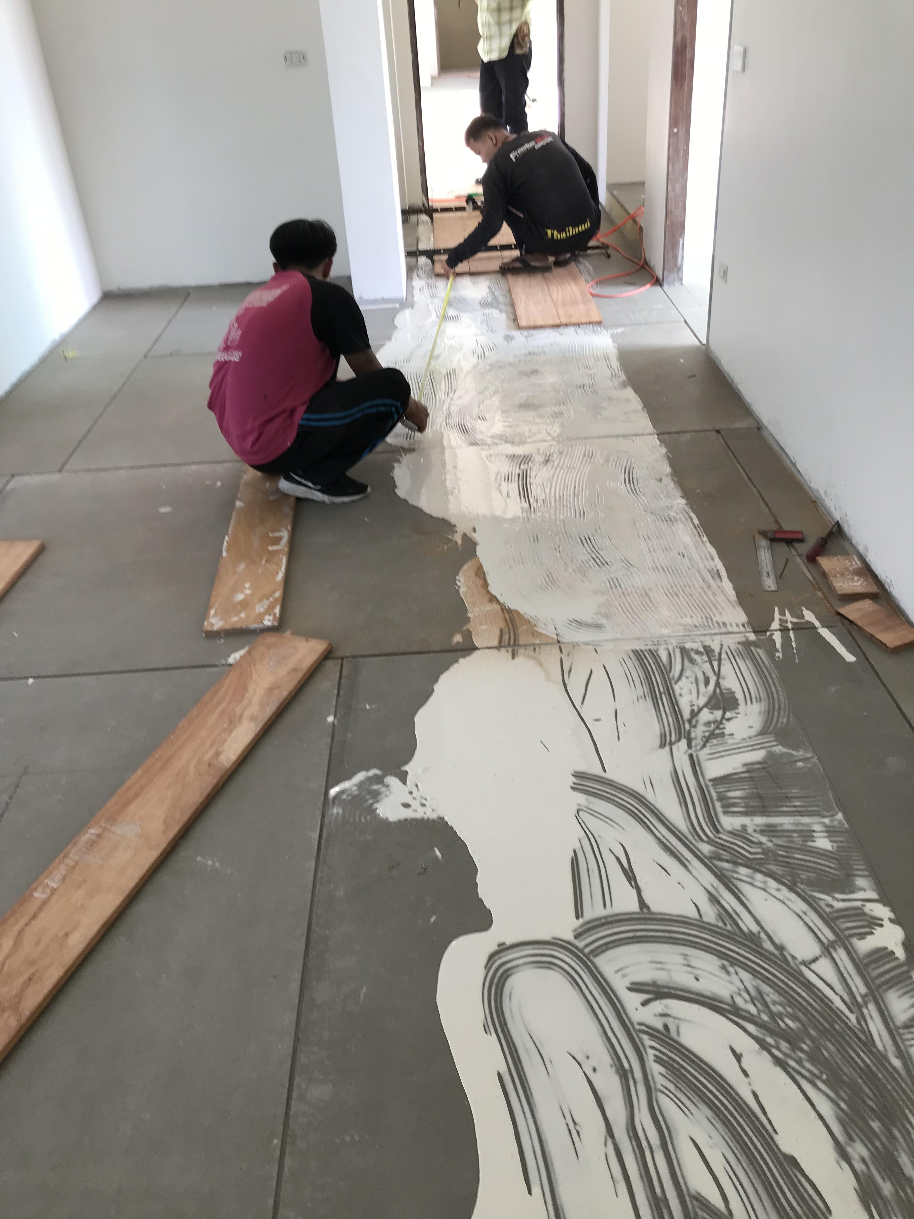 รับปูพื้นไม้