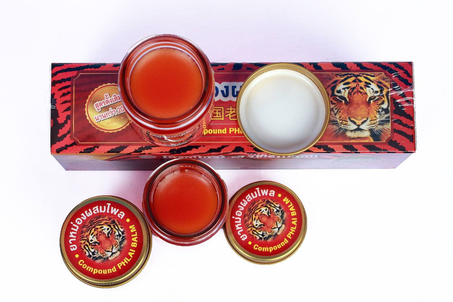 ยาหม่องหน้าเสือสีแดง สูตรร้อนไพลเข้มข้น ขนาด 50 กรัม ยาหม่องที่ขายดีมากในกลุ่มทัวร์จีน 泰国老虎膏 Thai Plai Balm 50 กรัม (Tiger Phlai Red Balm 50)