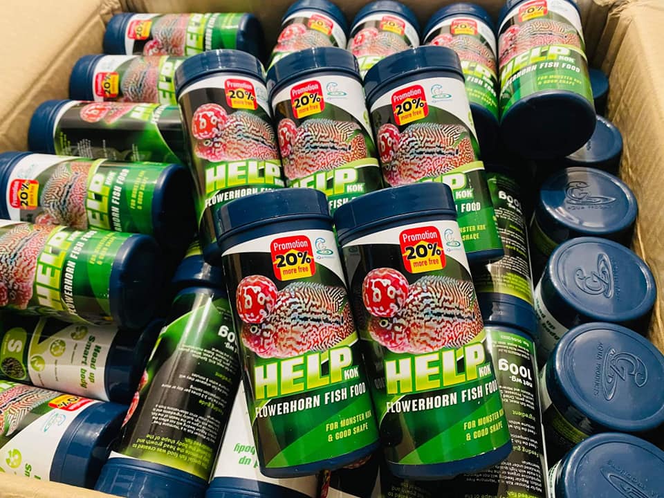 HELP KOK FLOWERHORN FISH FOOD 100 g.(อาหารปลาหมอสีสูตรเร่งโหนก และรูปทรง โปรตีนสูง เร่งโหนกไว)