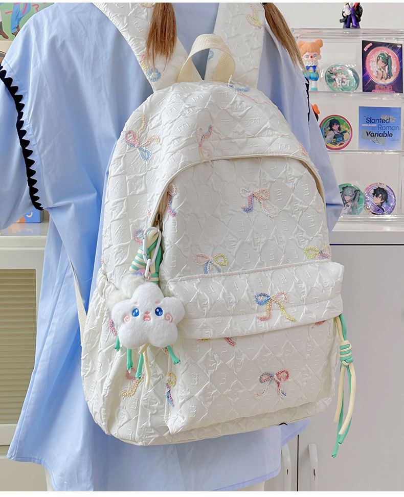 กระเป๋าเป้ ปักโบว์ แถมพวงกุญแจดาว รหัส Bag008