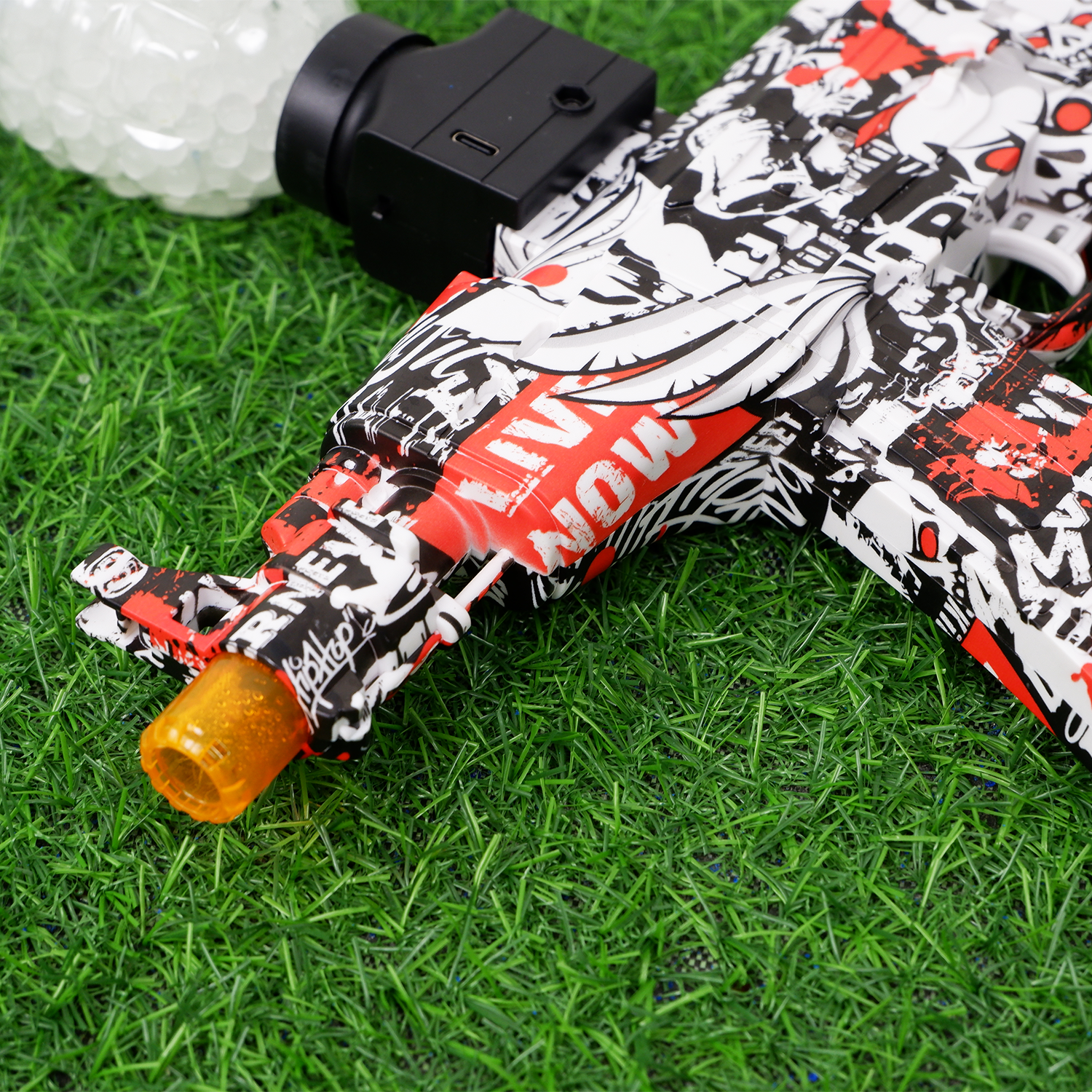 (03)AKM47 mini สีแดงลายกราฟิกตี้ ปืนเจลไฟฟ้า